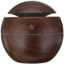 Casey Ultrasonic Aroma Mini Portable Humidifier Dark Wood Grain Finish Round Ball Design-With Plain Pattern Wood Base 200ml Water Capacity 7 Soothing LED Lights USB Powered Purifies And Humidifies Air For Home Office And Car