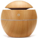 Casey Ultrasonic Aroma Mini Portable Humidifier Light Wood Grain Finish Round Ball Design-With Plain Pattern Wood Base 200ml Water Capacity 7 Soothing LED Lights USB Powered Purifies And Humidifies Air For Home Office And Car