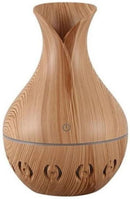Casey Ultrasonic Aroma Humidifier Light Hollow Wood Grain Finish With Creative Pattern Base – 200ml Water Capacity Vase Shaped Design With Creative Pattern Wood Base 7 Soothing LED Lights USB Powered Purifies And Humidifies Air For Home Office And Car